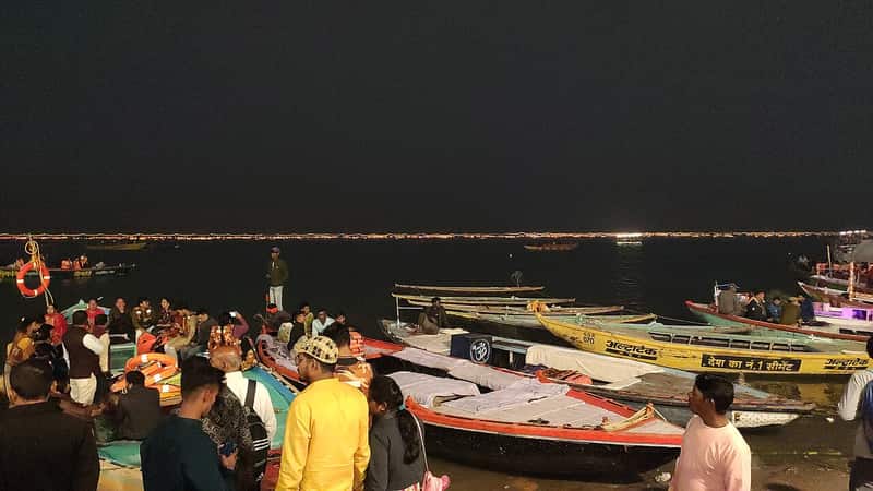 A boat trip arriving at the ghat at sunrise