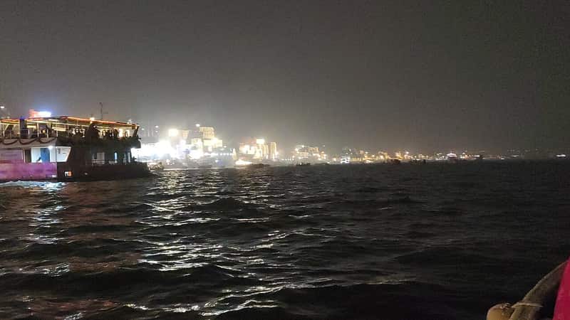 Boatmen and boats on the river at Chausatti Ghat