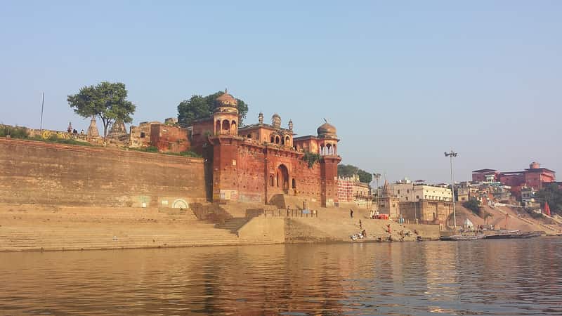The narrow lane and sheltered courtyard that hide the ghat