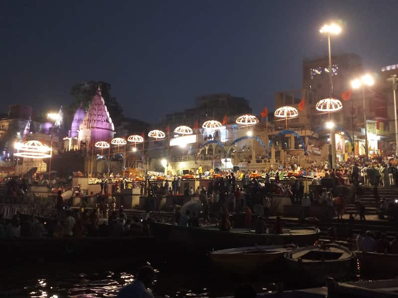 The evening Ganga Aarti with brass lamps and priests at Dashashwamedh