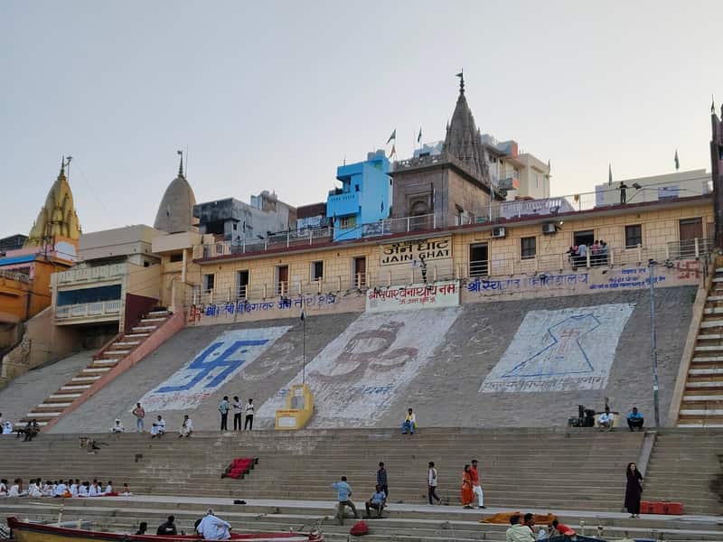 The broad Ganga flowing past Jain Ghat at sunset