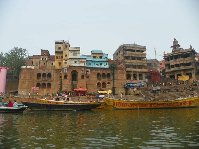 Worshipers performing puja with offerings at Jalasen Ghat