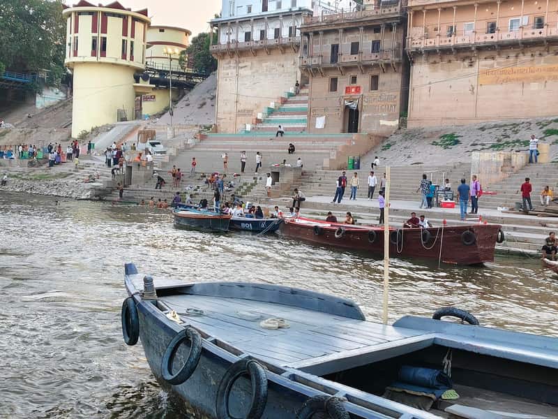 Bathers on the steps of Janaki Ghat at sunrise