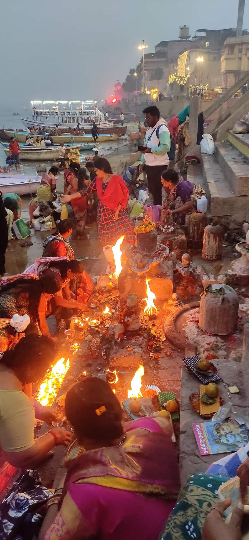 Boatmen and bathers at the Janaki Ghat landing
