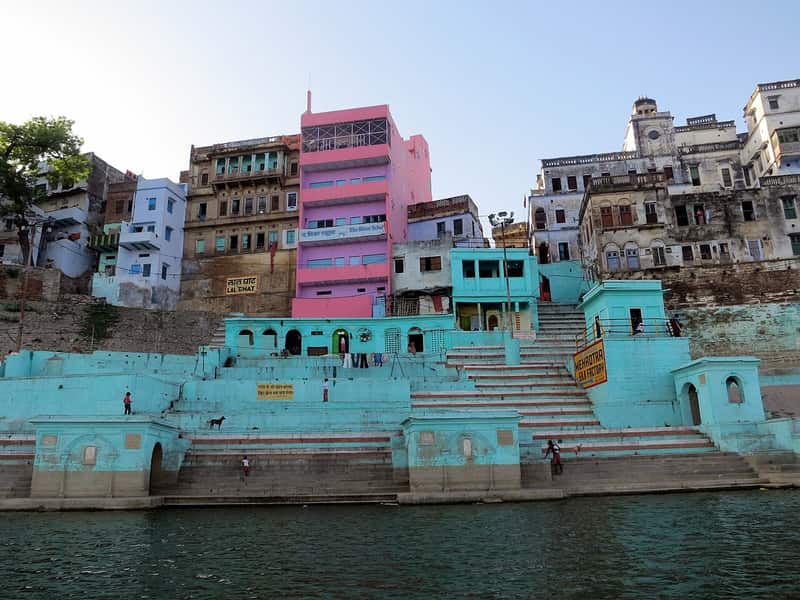 Bathers standing in the river shallows at Lal Ghat at dawn