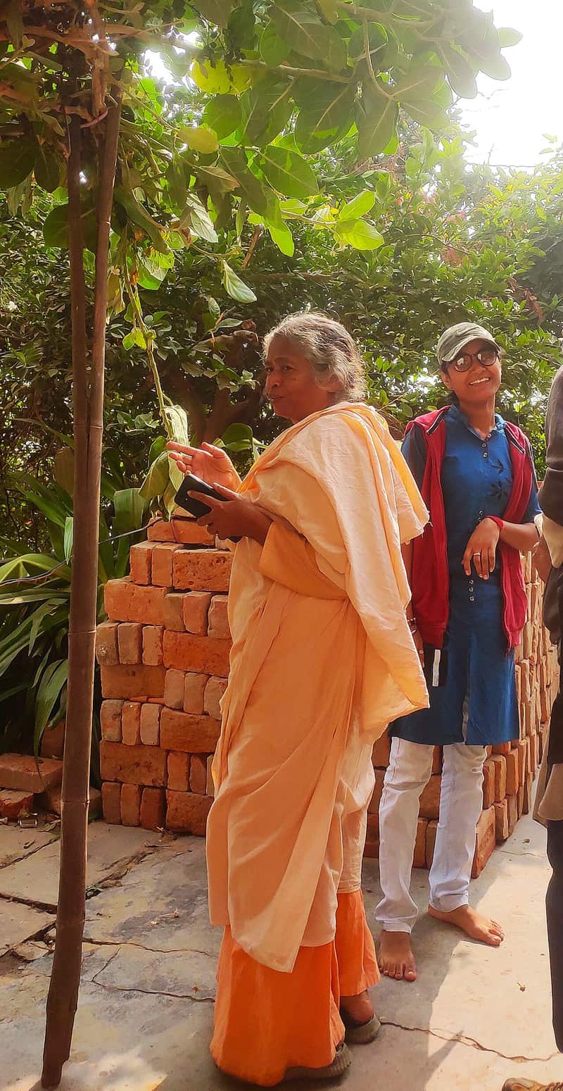 Steps of Lali Ghat with a boatman and morning light