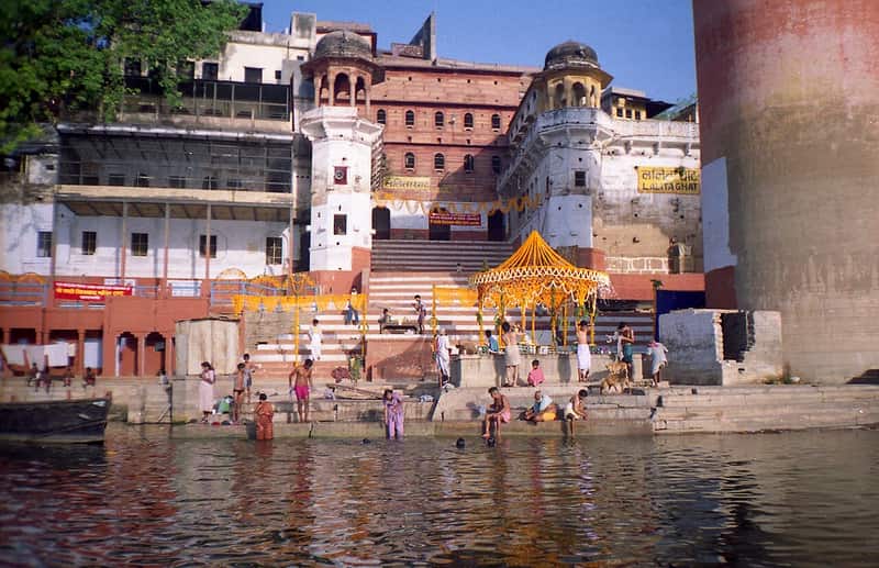 Bathers performing their morning rituals on the steps