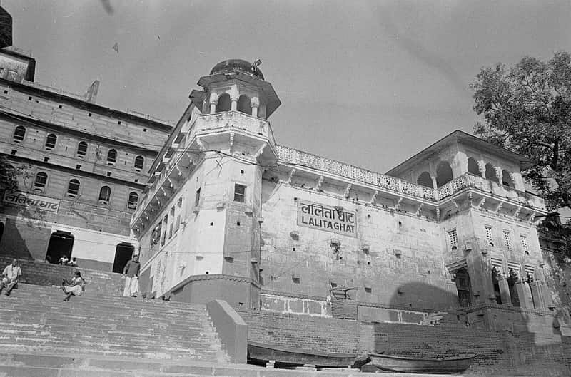 The narrow entrance and weathered stone of Lalita Ghat