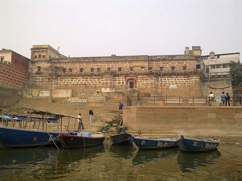 Boats moored at Mahanirvani Ghat with the old city rising behind