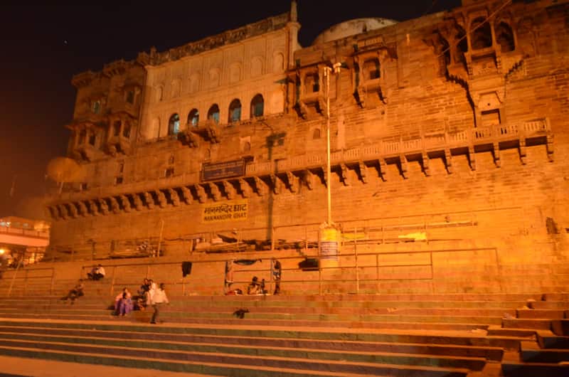 Panoramic view of the river bend and the rooftops of Varanasi from the Man Mandir balcony