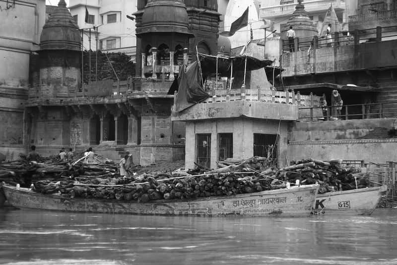 Manikarnika Ghat during a festival, crowded with lights
