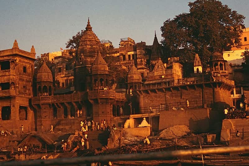 The ghat with its distinctive tower beside the Manikarnika Kund