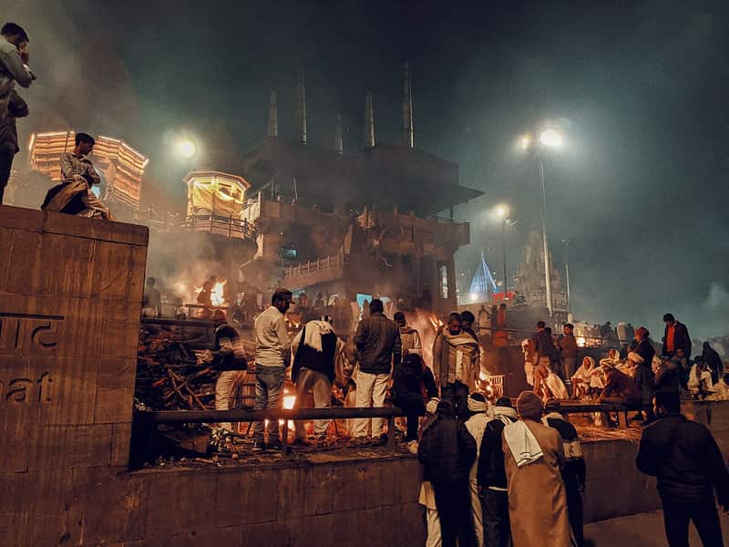 The burning ghat with funeral pyres on the platform