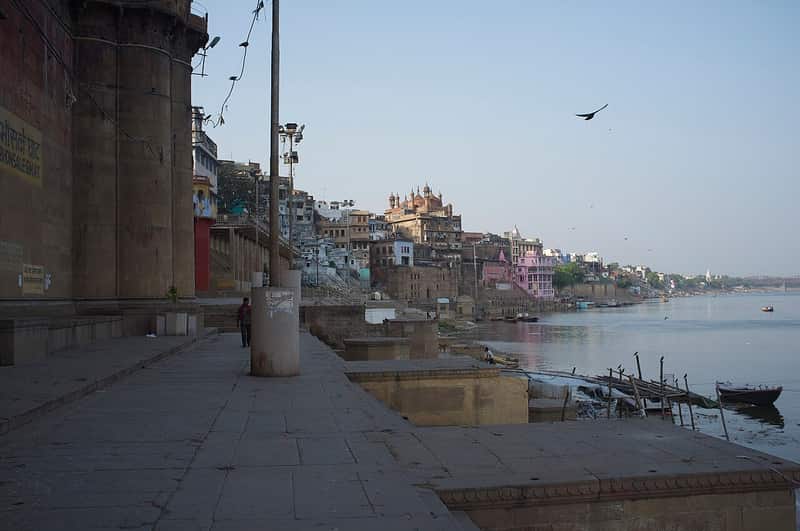 The broad grey Ganga stretching from the steps of Mehta Ghat toward the far shore