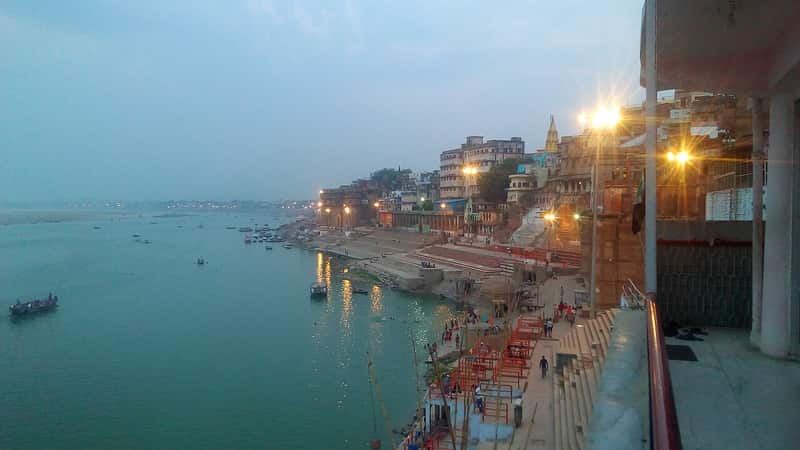 A row of moored rowing boats at Mehta Ghat seen from the top of the steps