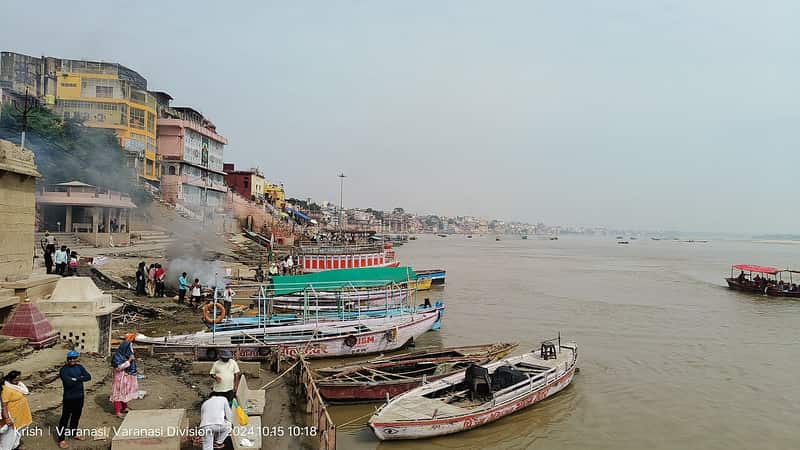 Morning bathers on the steps of Munshi Ghat, dipping into the Ganga at sunrise
