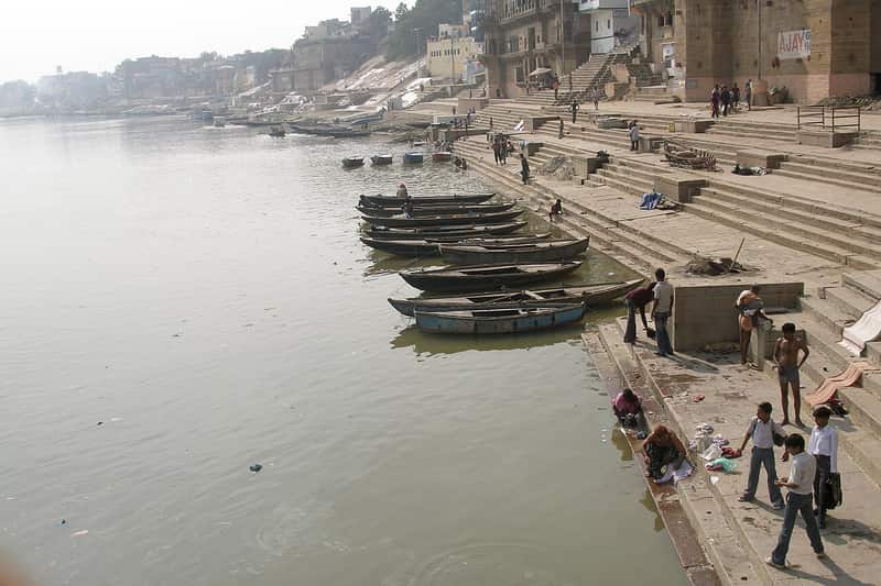 Lamps and marigolds adorning the ghat for a local festival