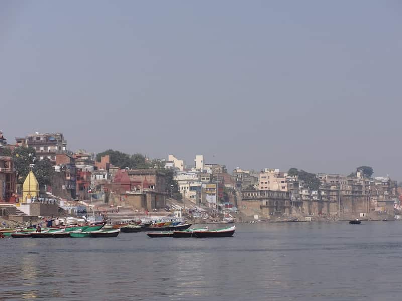 Narrow lanes behind Raj Ghat with temple spires