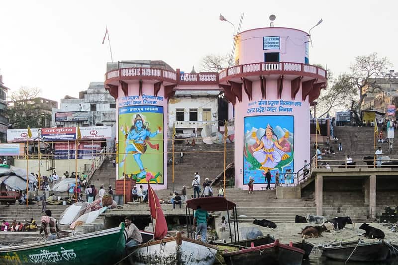 Pilgrims bathing in the Ganga at dawn on the ghat steps