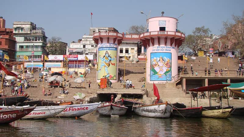 Rowboats moored along the ghat at the waterline