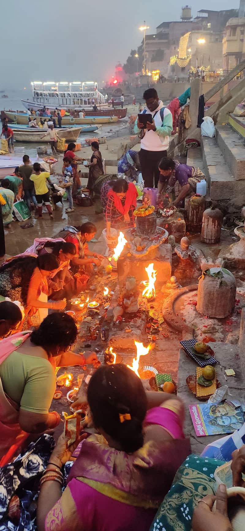 Women praying with offerings at the temple of the goddess