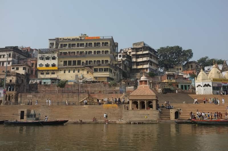 The smoke of Manikarnika rising beyond the spur of Scindia